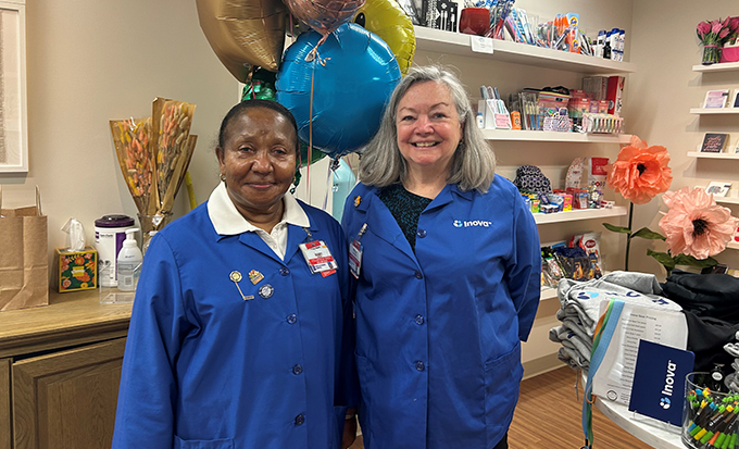 two female volunteers in gift shop