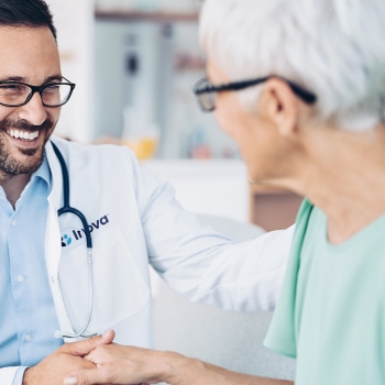 doctor shaking hands with patient