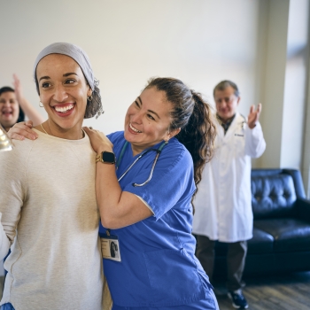 Happy, smiling patient and doctor